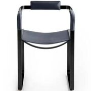 Pair of wanderlust armchairs in black and black metal.