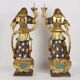 Antique wooden lacquered angel-shaped candlesticks, 18th century.
