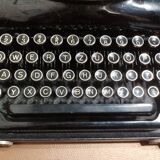 Remington portable typewriter from the 1930s and safe