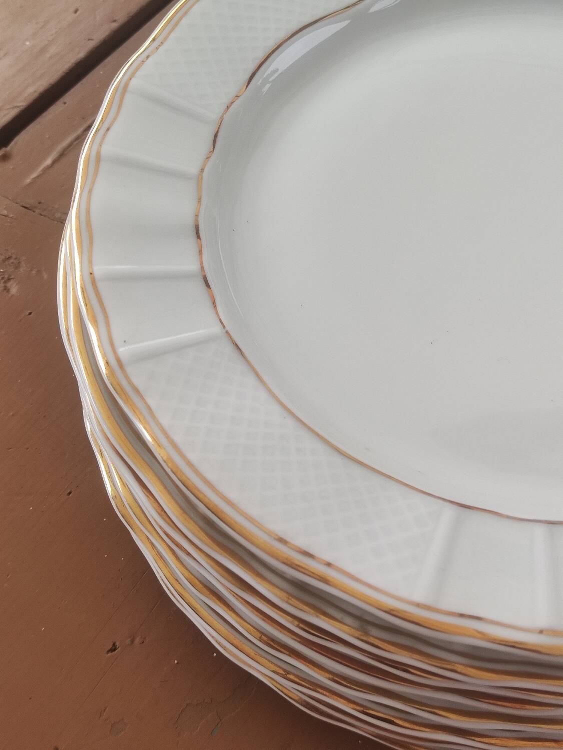 Ten Limoges porcelain plates B et Cie