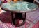 Vintage green sea marble and rosewood table from the 1970s.