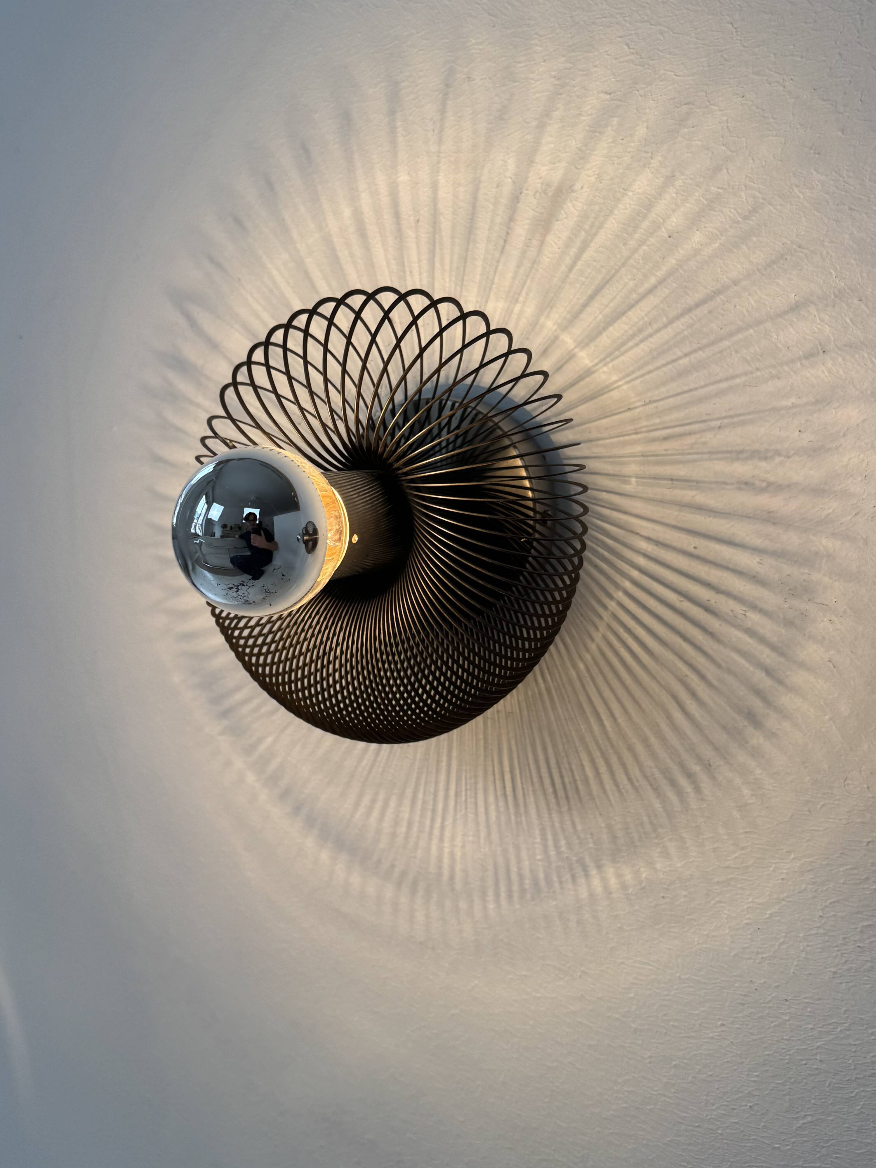 Vintage spring wall lights, matte metal, France, 1970.