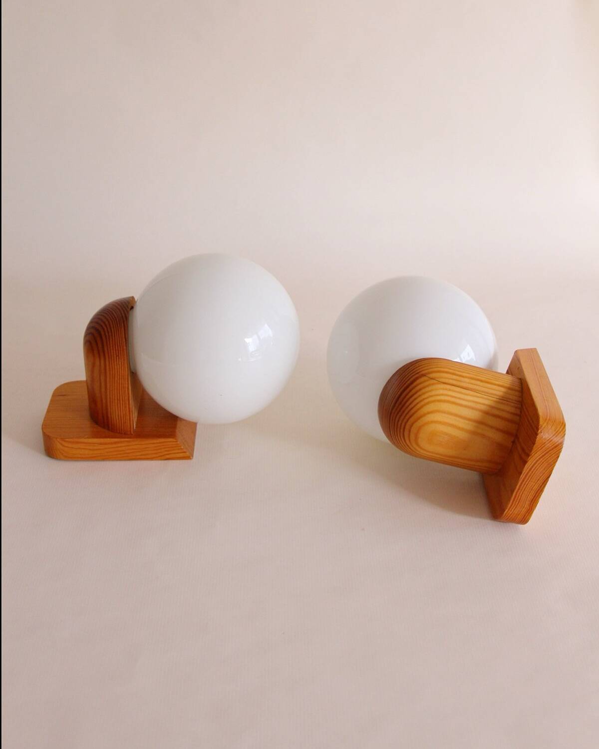 Pair of wall lights in pine and opaline, 1960s.
