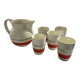 Red, white and silver porcelain jug set by Edmond Bellefroid for Robo.