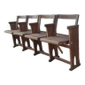 Row of 4 vintage cinema armchair seats in weathered wood