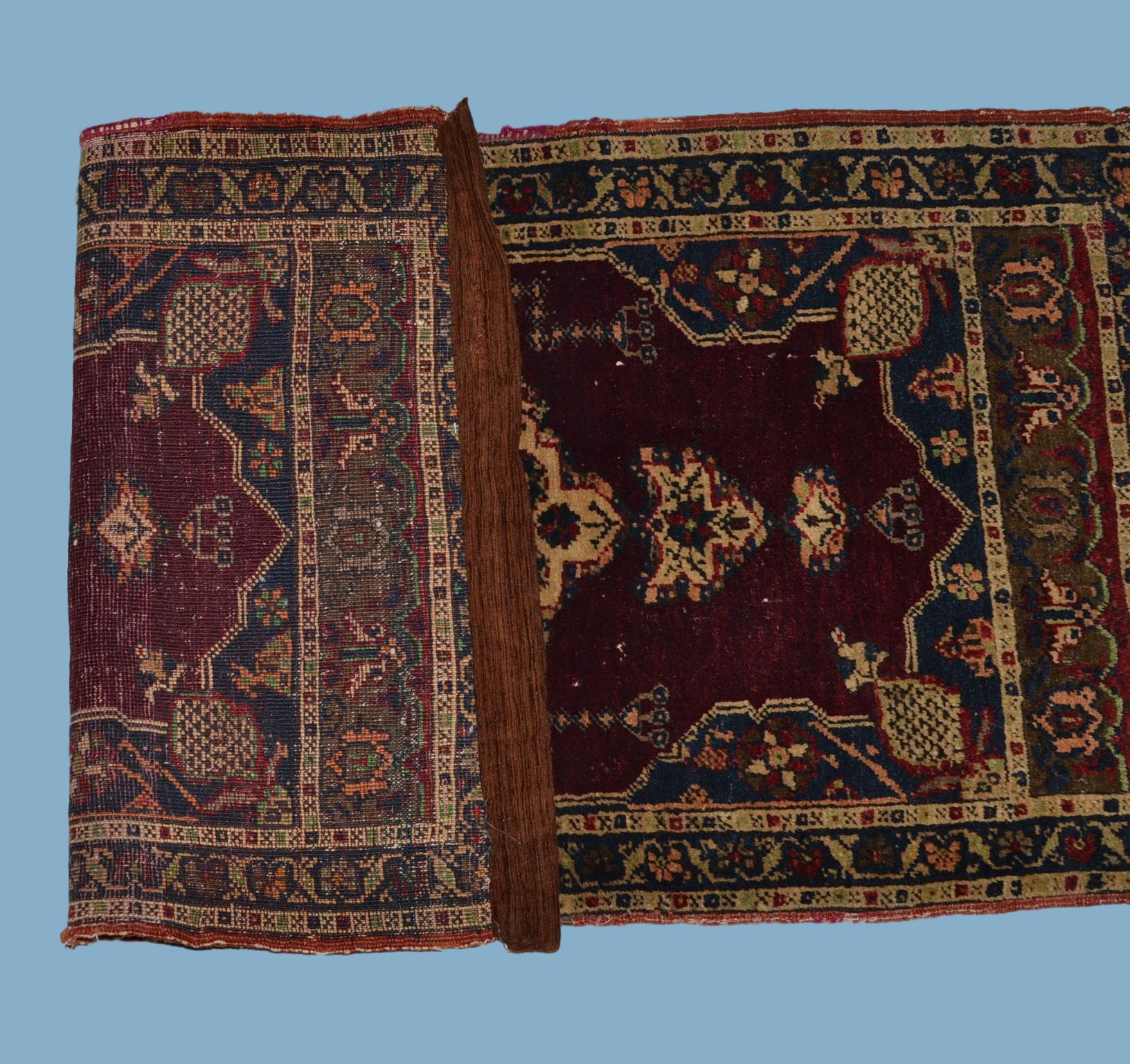 Old Hereké carpet, Turkey, 55 cm x 102 cm, hand knotted wool, 19th century