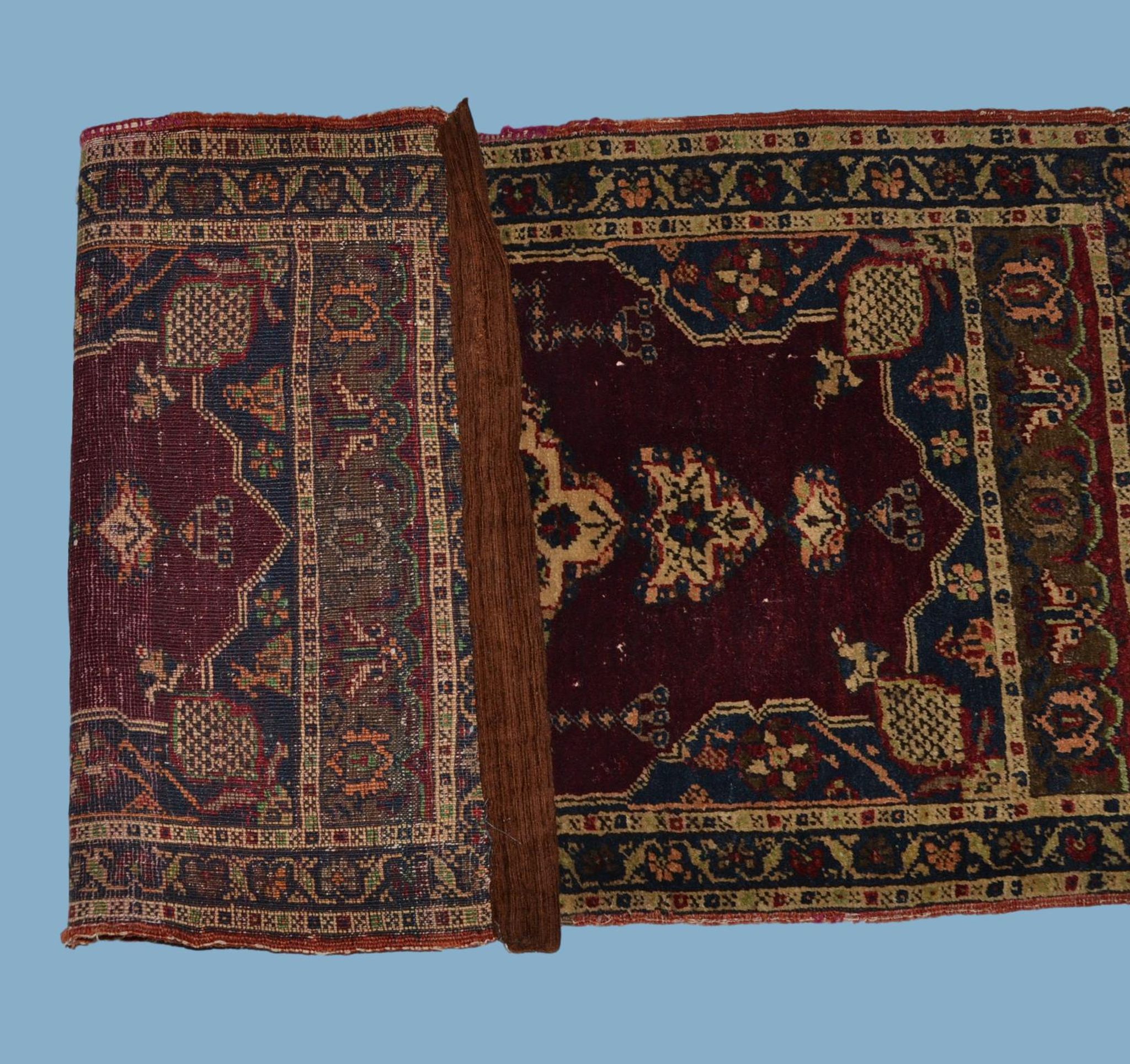 Old Hereké carpet, Turkey, 55 cm x 102 cm, hand knotted wool, 19th century