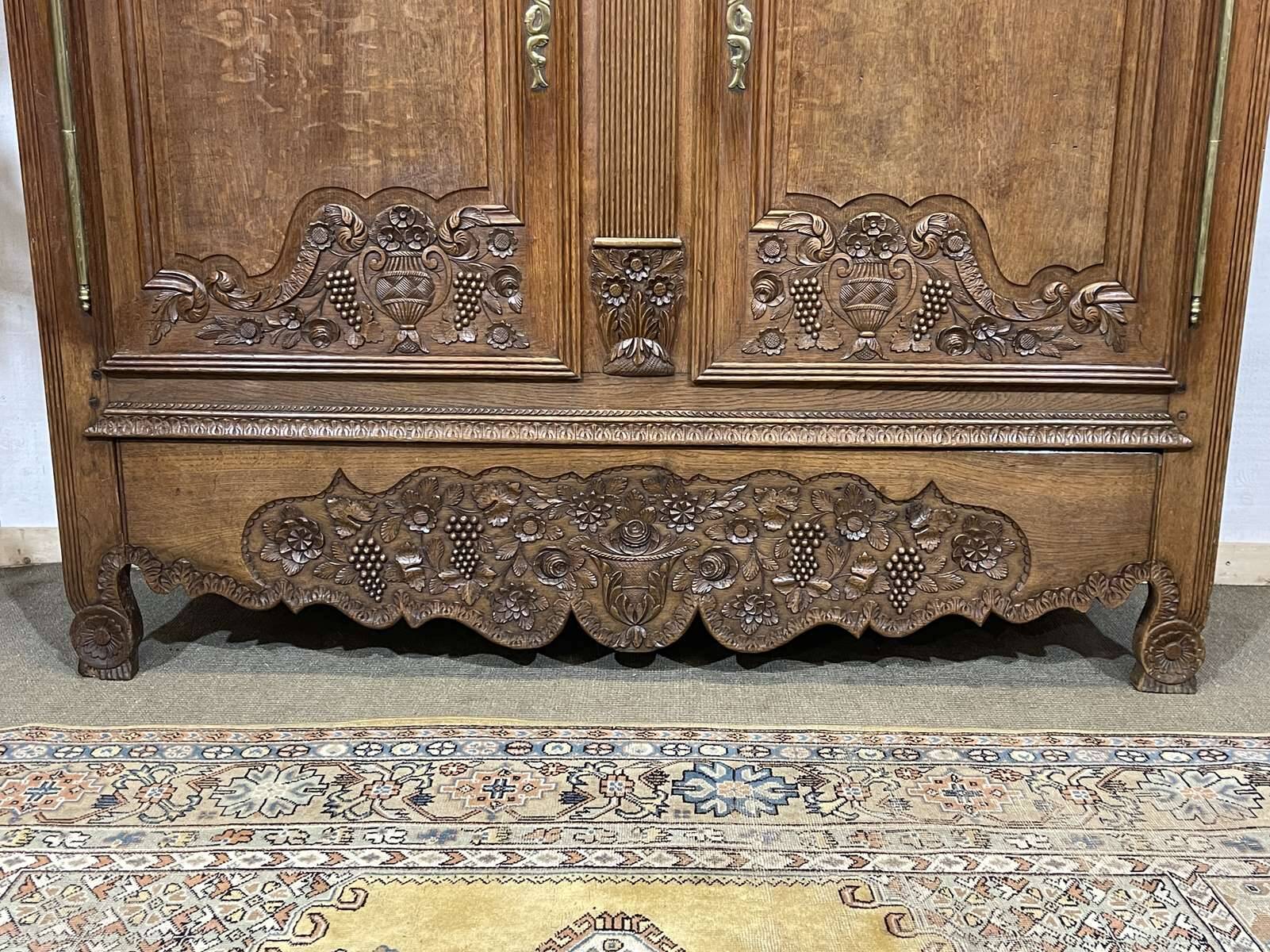 19th-century Norman wedding armoire in blonde oak.