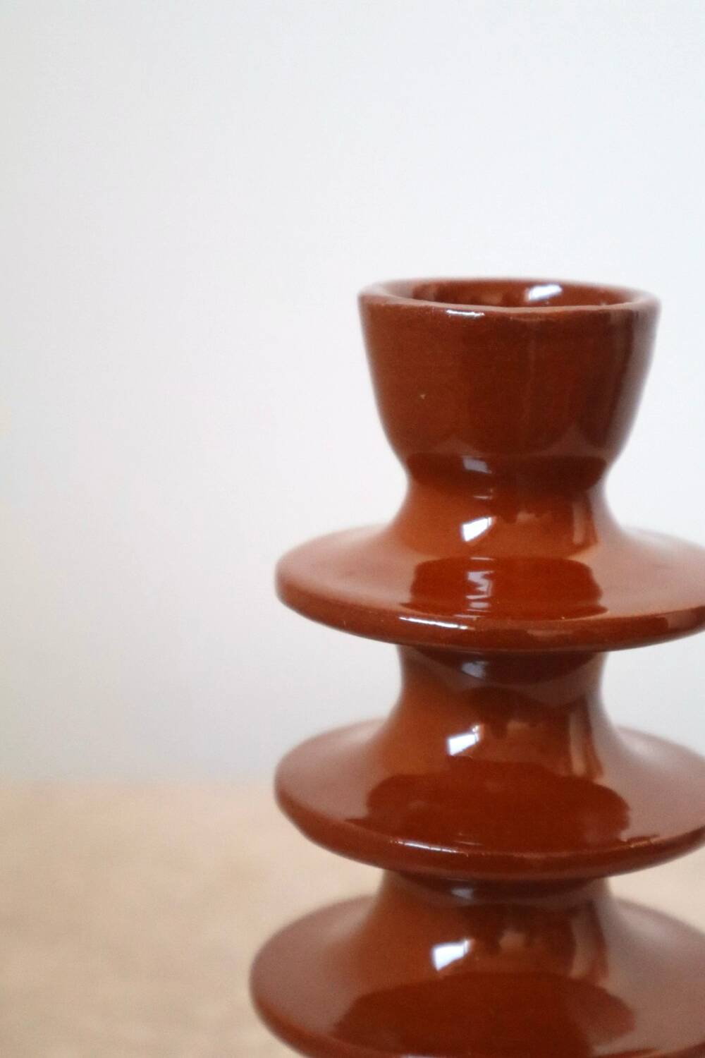 Modern brown colored ceramic candle holder