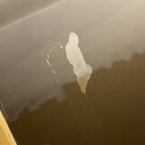 Coffee table in solid brass and black opaline. 1970