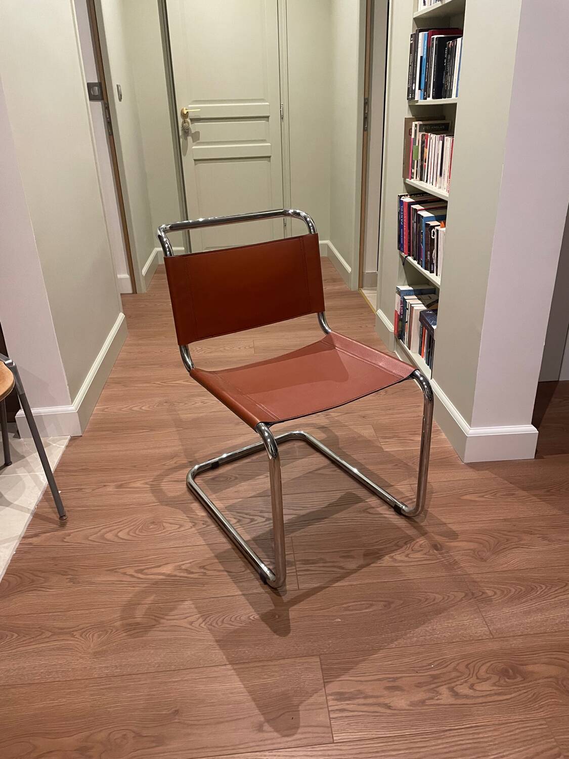 Hanging chair in Mart Stam S33 style in chrome metal and cognac imitation leather