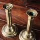 Pair of brass push-button candlesticks