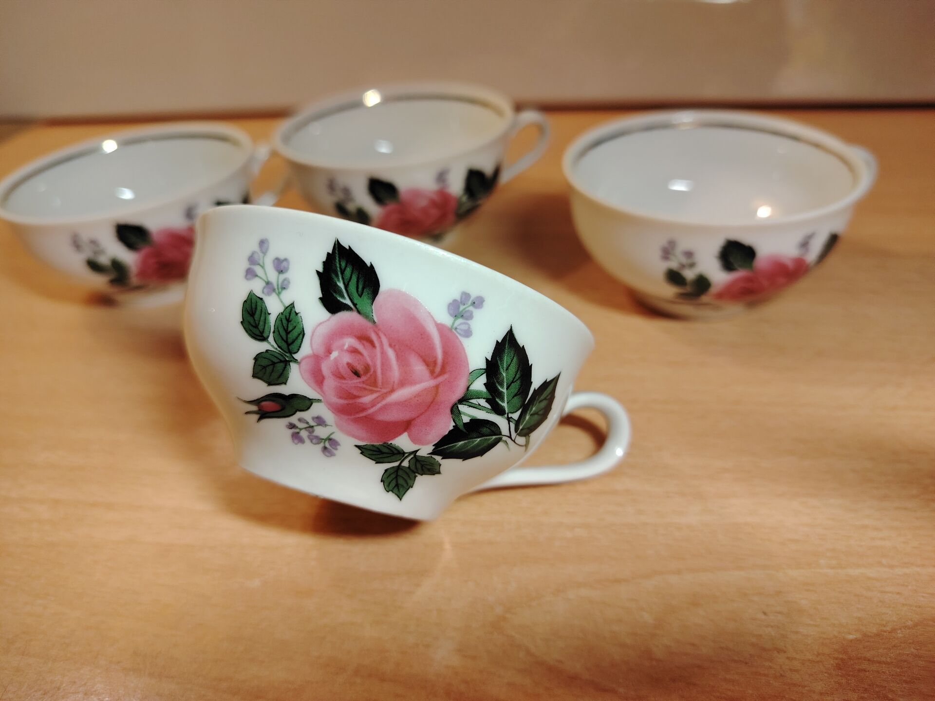 Set of 4 antique porcelain cups with rose pattern CNP France