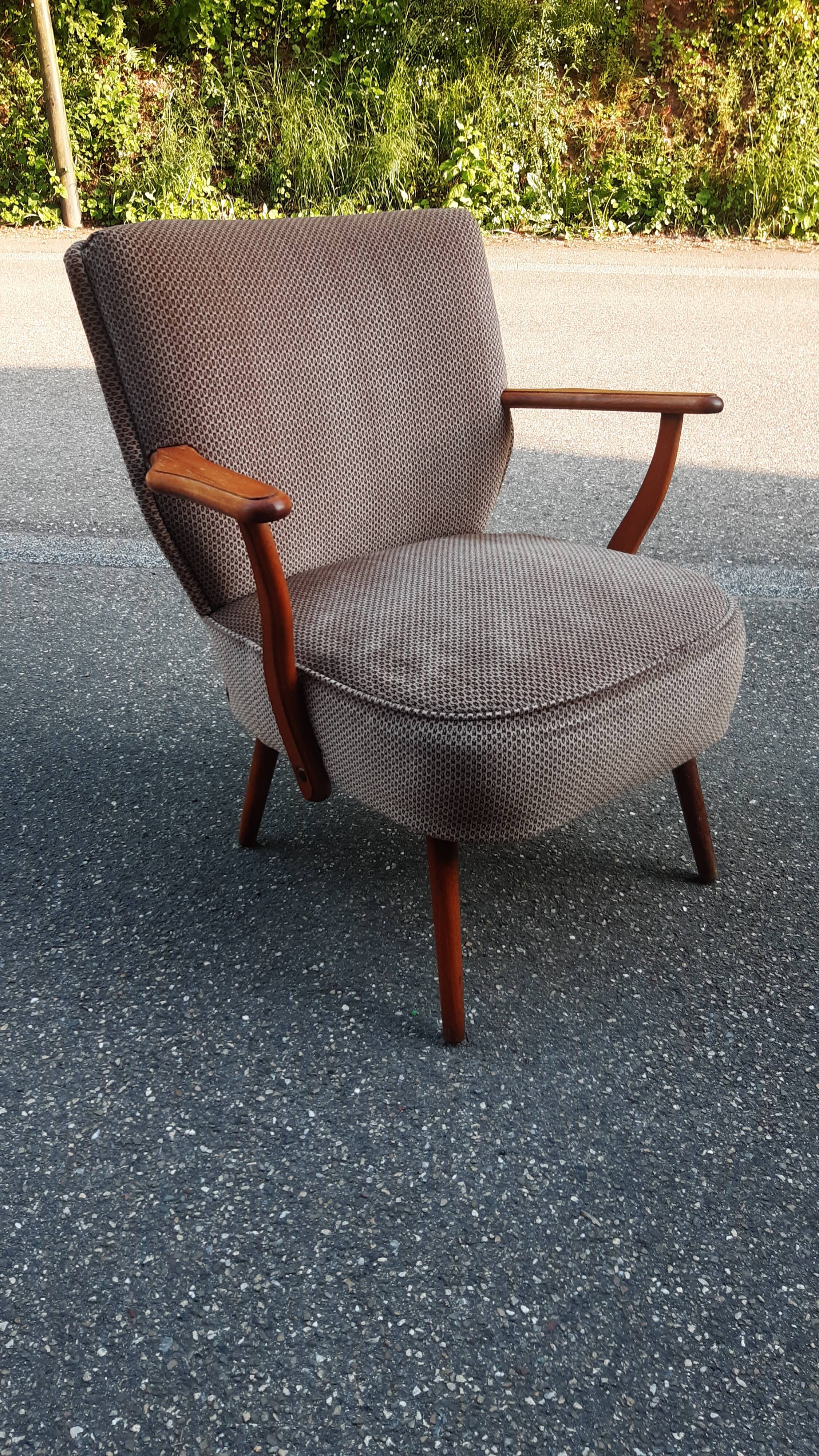 Cocktail armchair with armrests