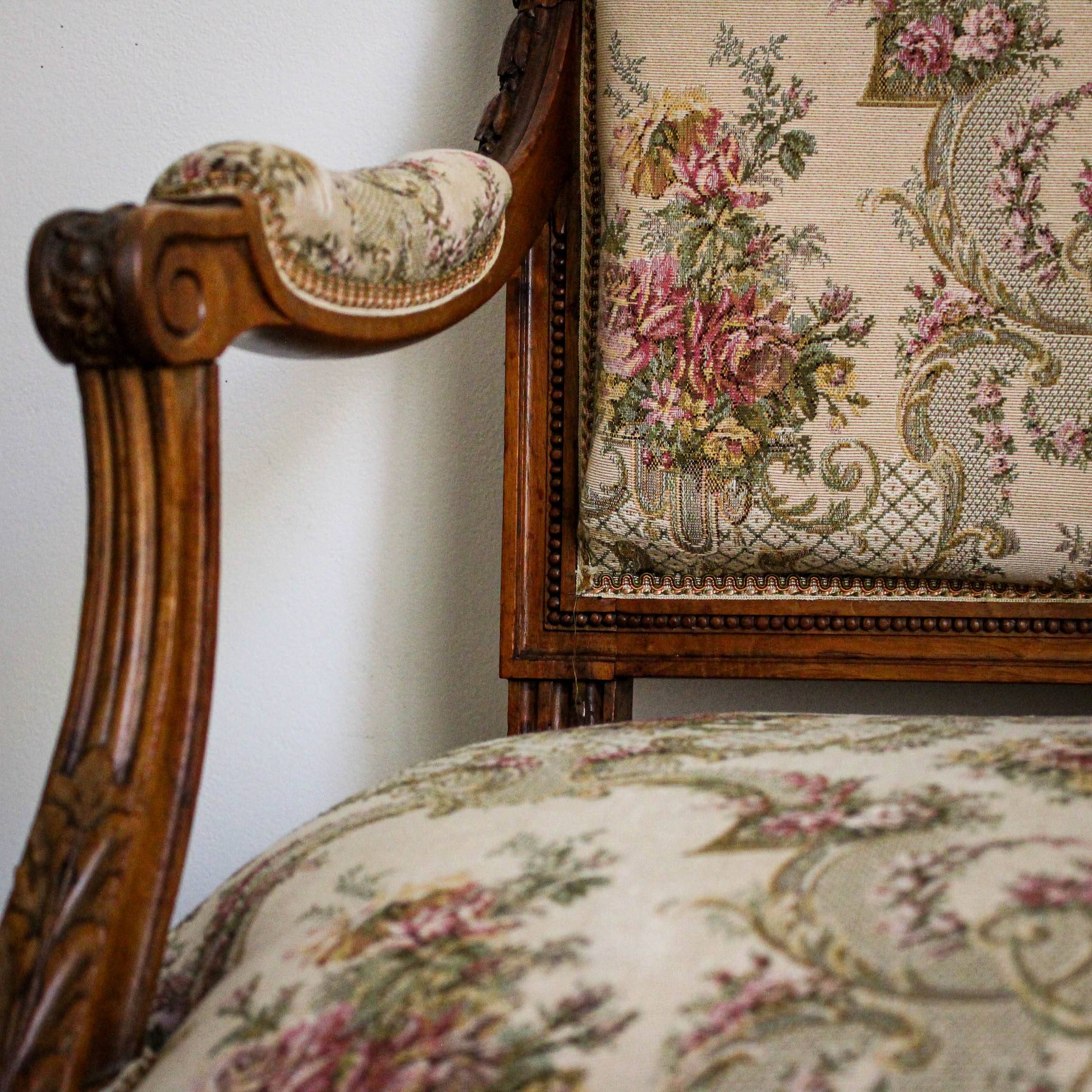 Louis XVI style carved armchair