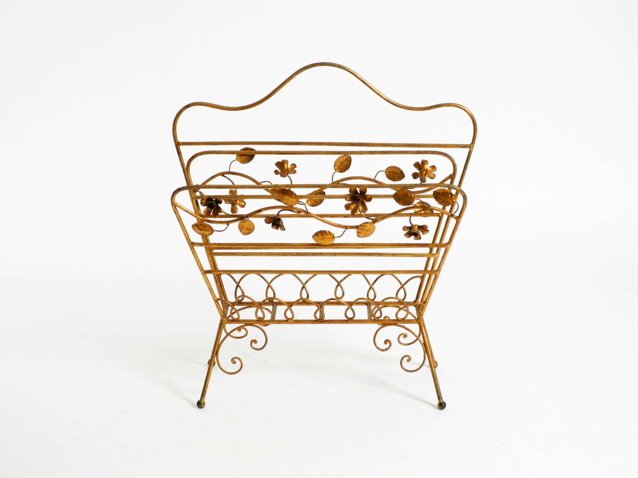 Extraordinary mid-century newspaper and magazine rack with a gilded metal