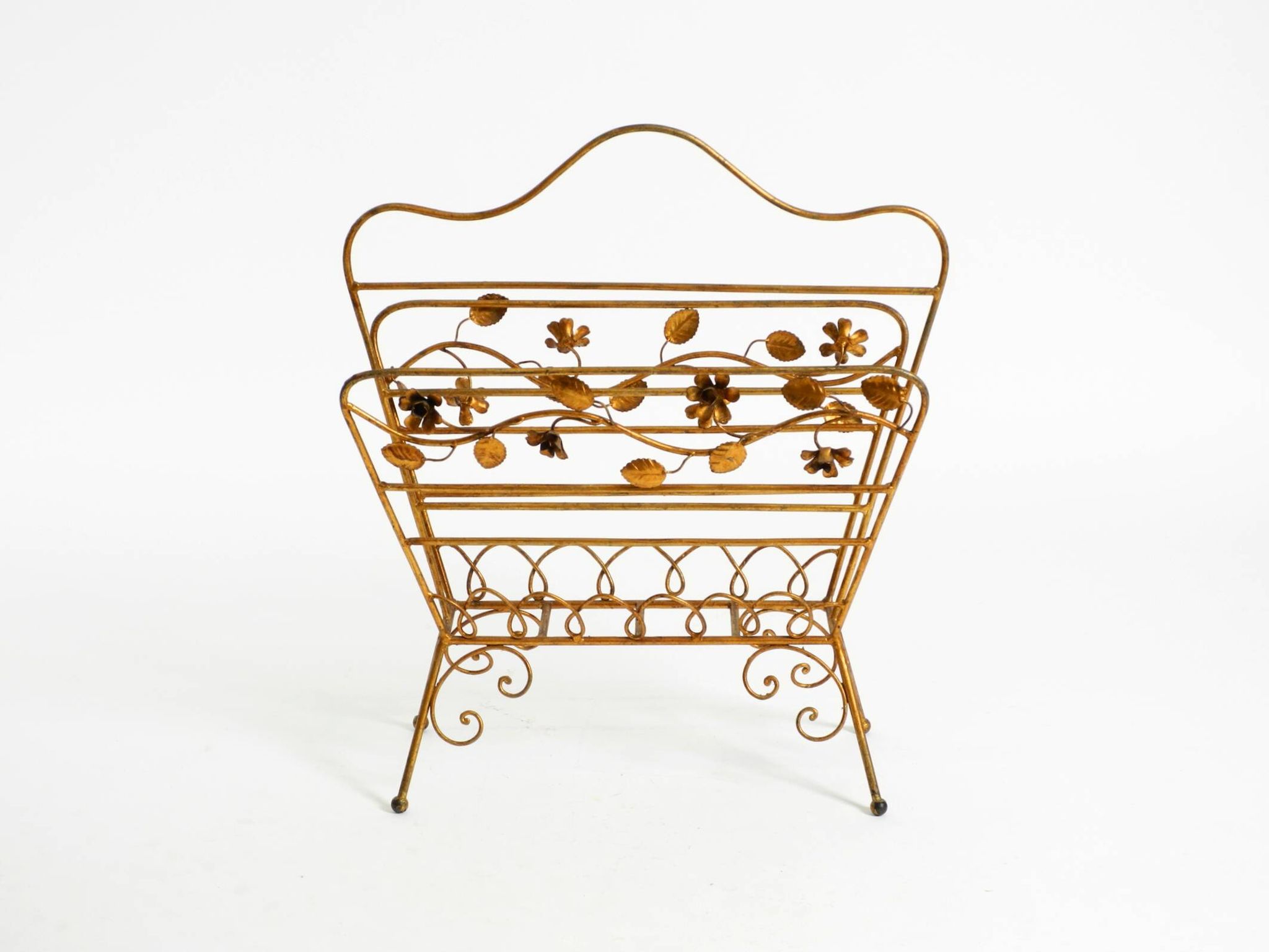 Extraordinary mid-century newspaper and magazine rack with a gilded metal