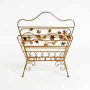 Extraordinary mid-century newspaper and magazine rack with a gilded metal