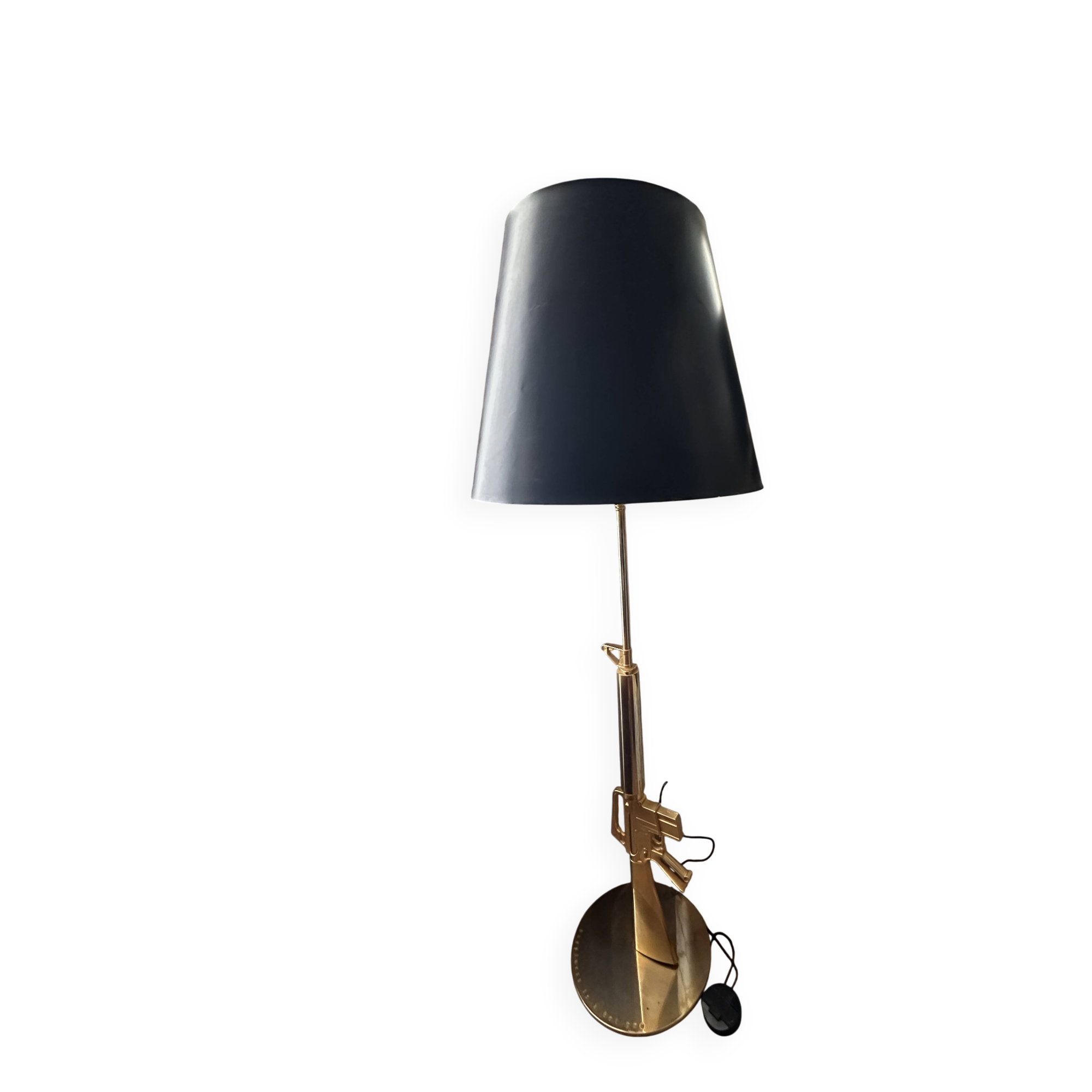 "Lounge Gun" floor lamp by FLOS by Philippe Starck – Gold