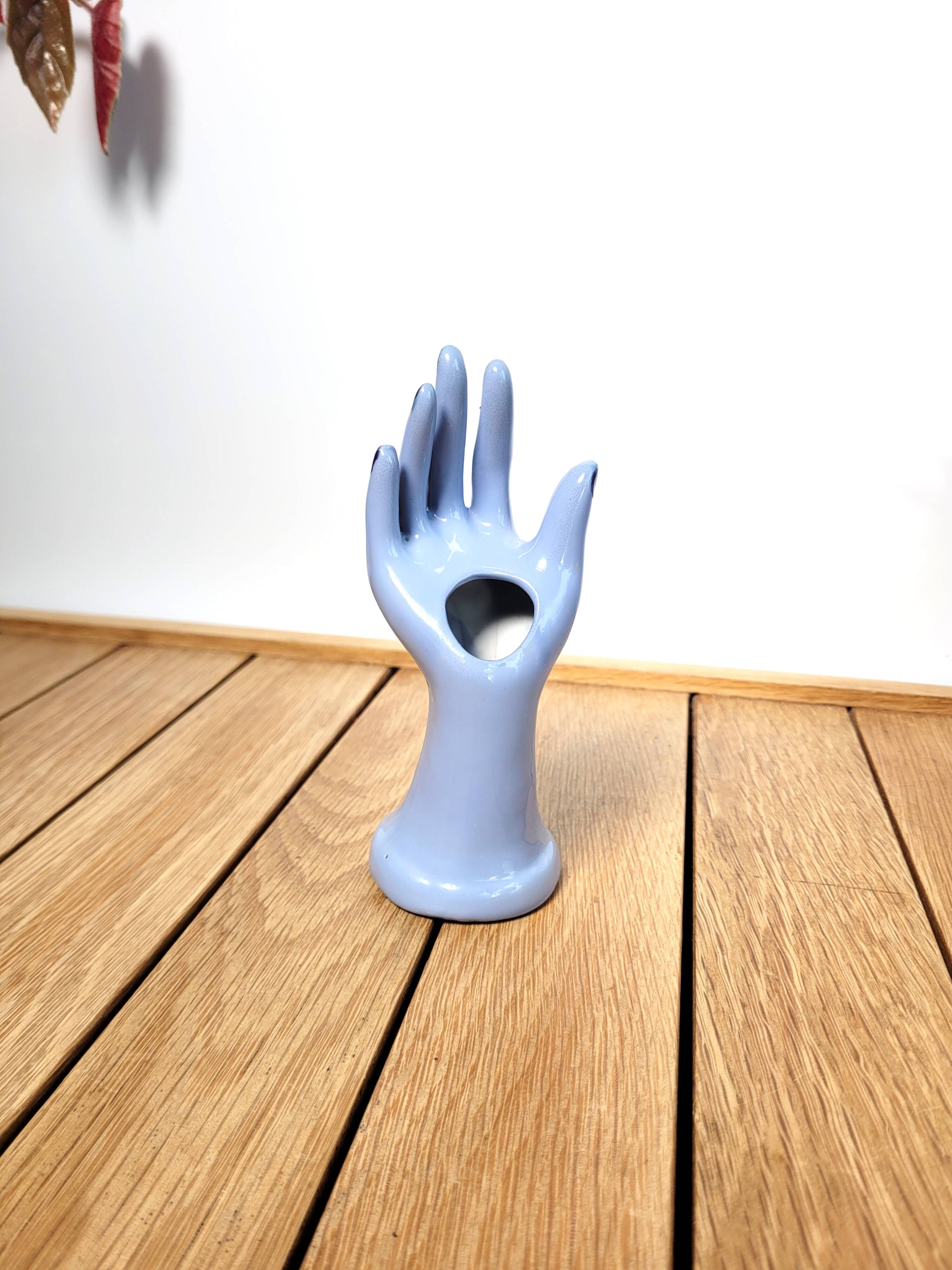 Small vintage ring sizer and purple soliflore