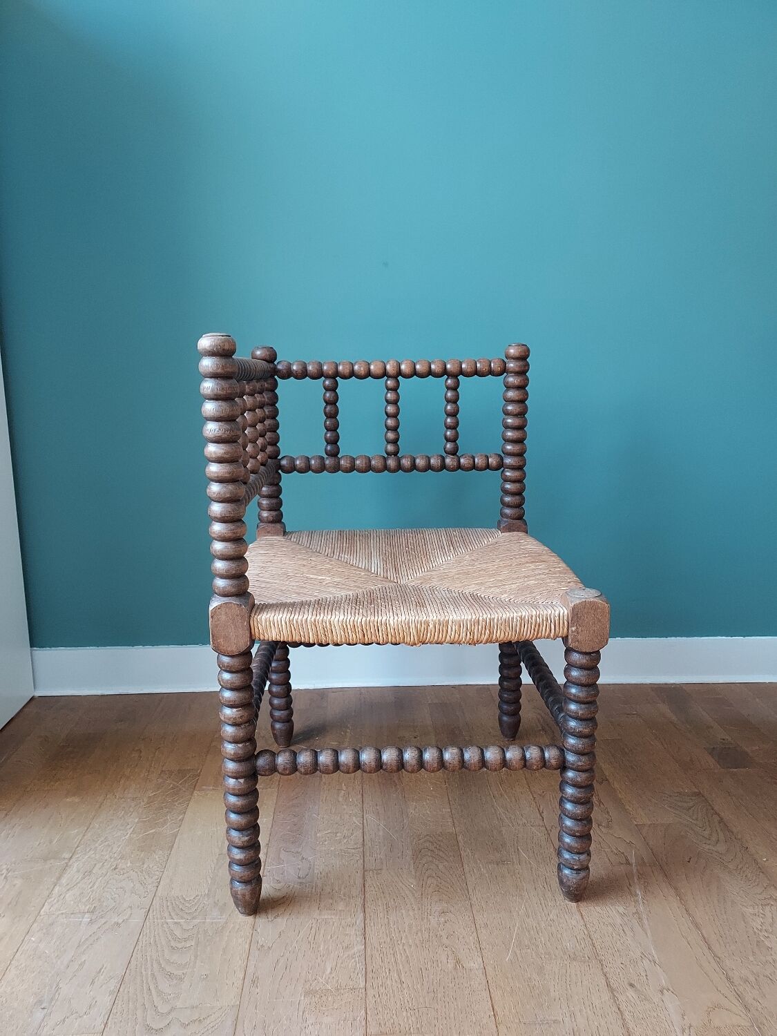 Corner armchair in turned wood