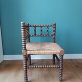 Corner armchair in turned wood