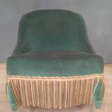 Fully upholstered chair called "toad"