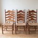 Set of 6 rustic-style chairs in wood and straw.