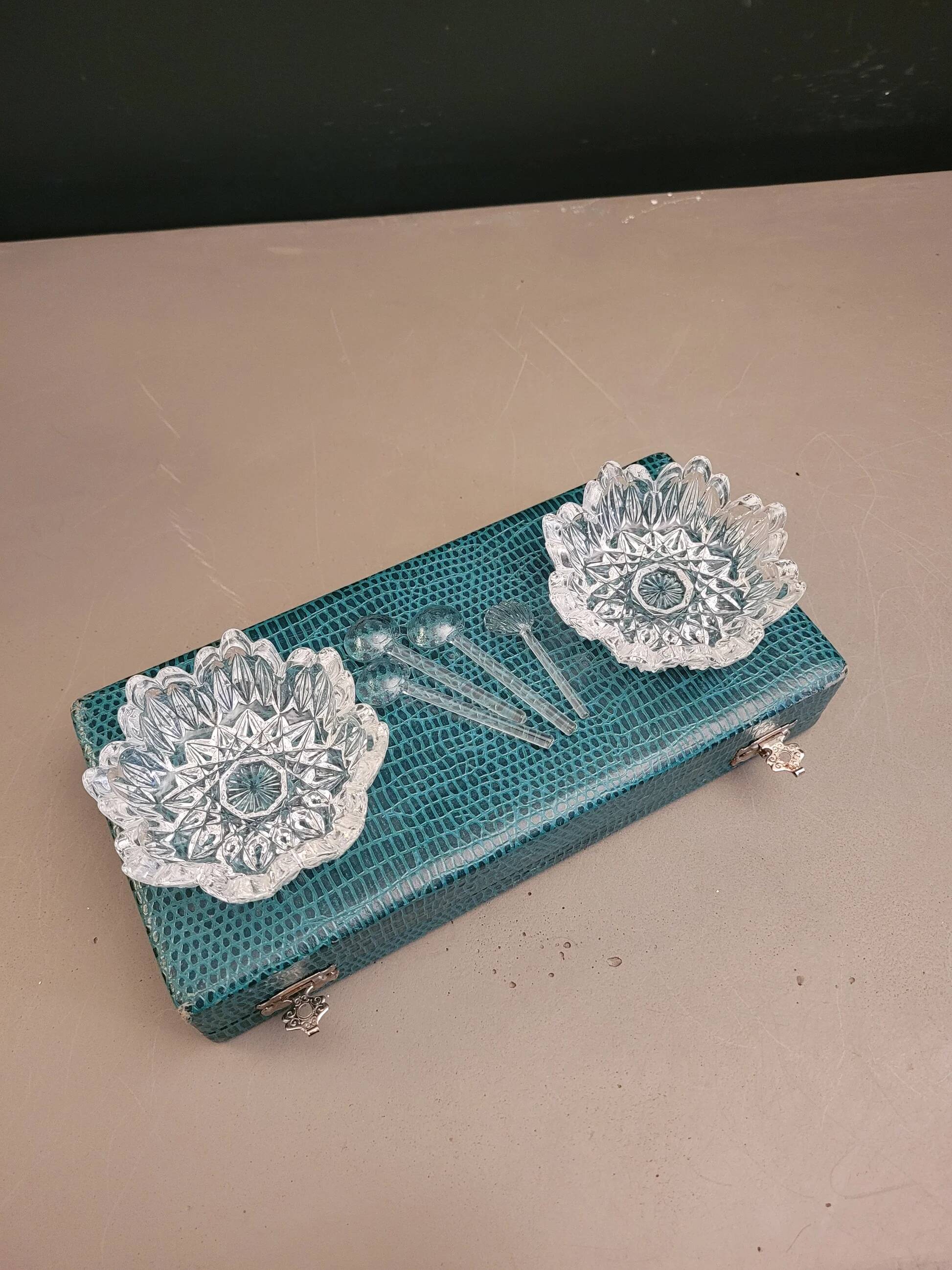 Pair of crystal salt cellars with spoons