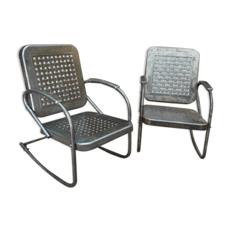 Pair of perforated metal rocking chairs usa 1950
