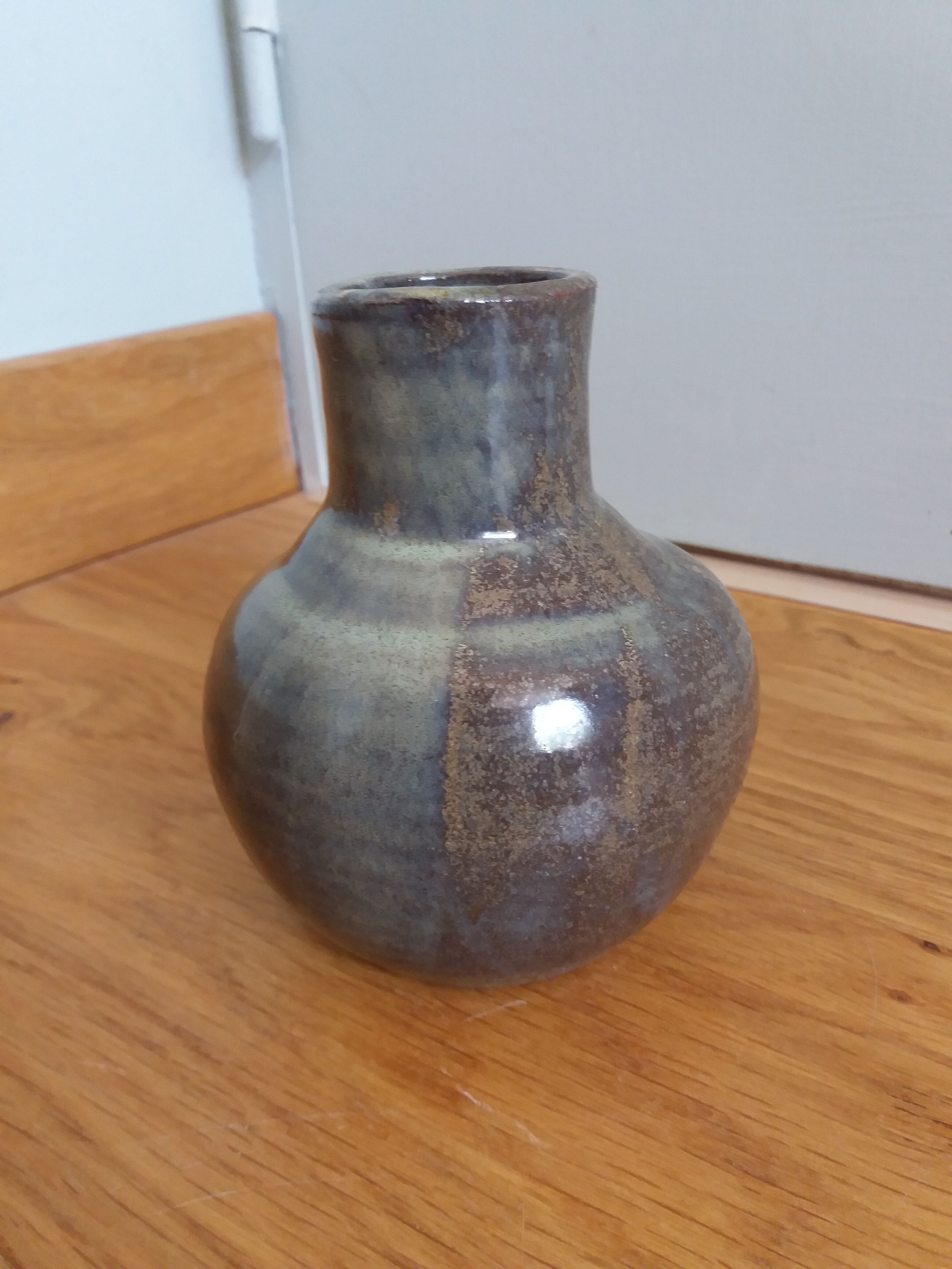 Enamelled stoneware vase signed