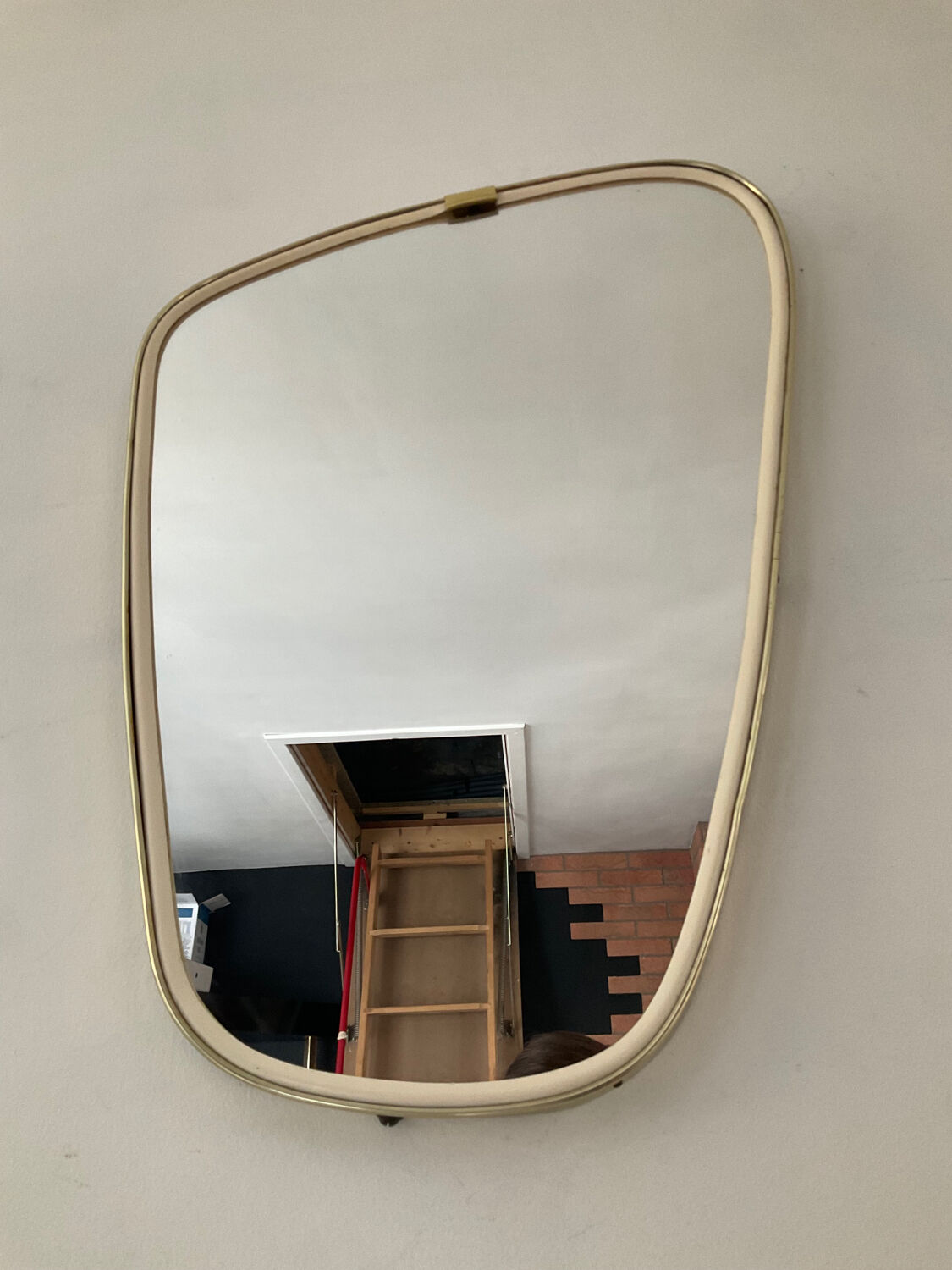 Asymmetrical mirror from the 60s freeform