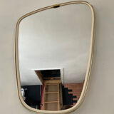 Asymmetrical mirror from the 60s freeform