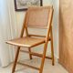 Folding wooden and cane chair