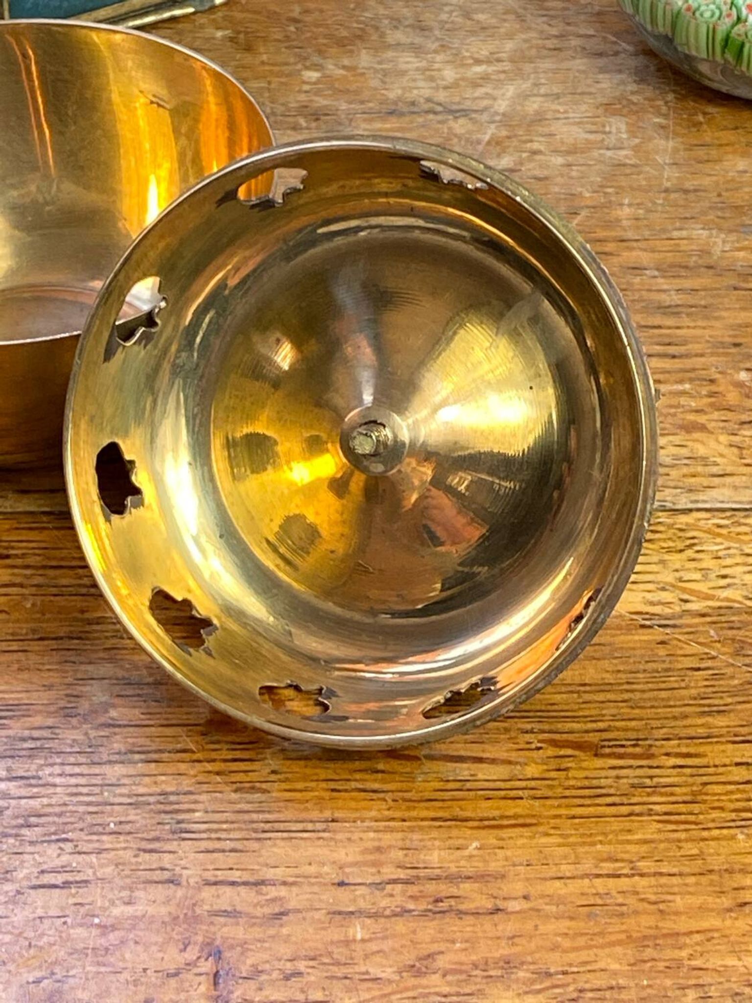 Bonbonnière, in the shape of an apple, made of brass.