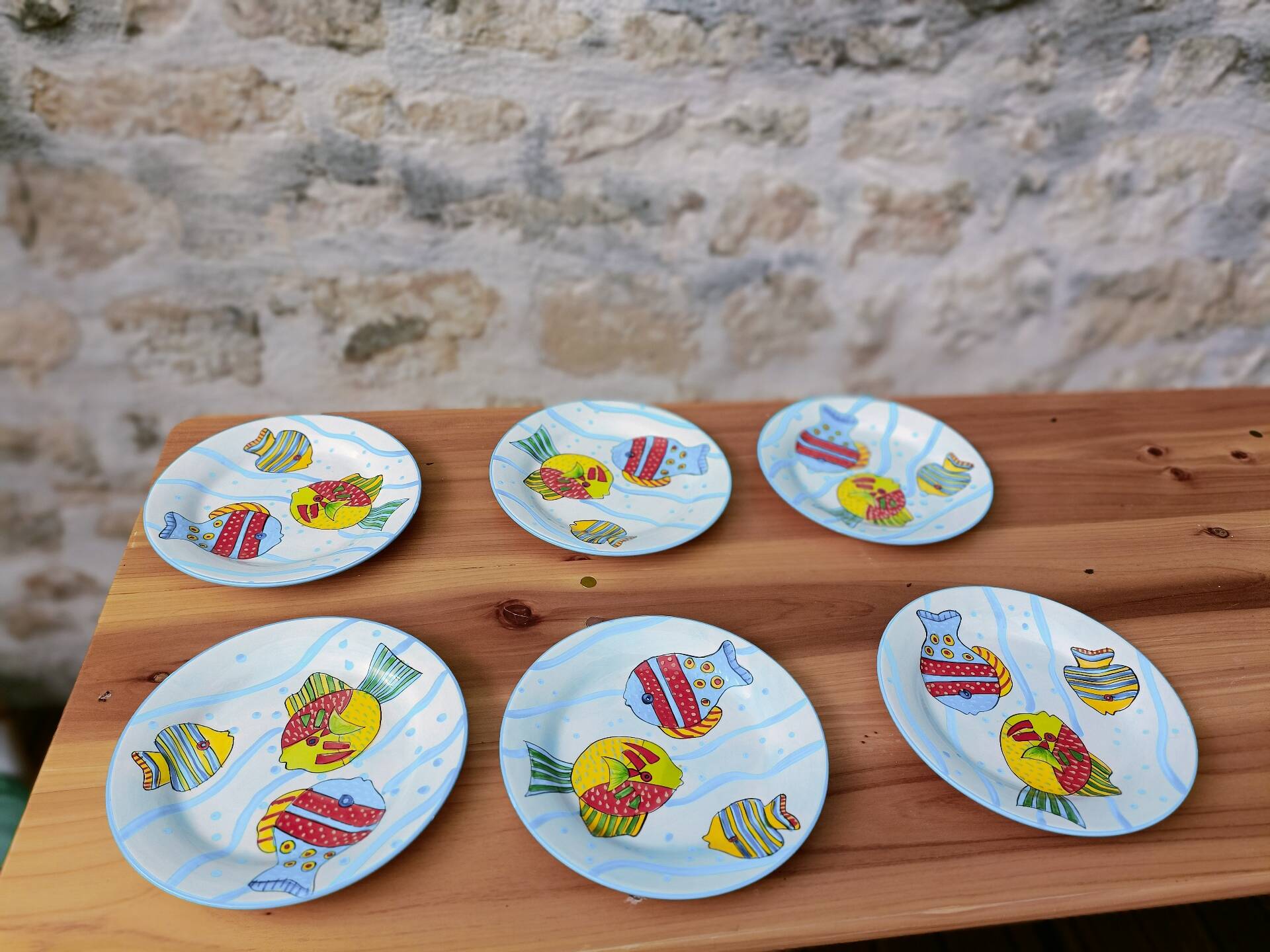 Dessert plates with a sea, beach theme.