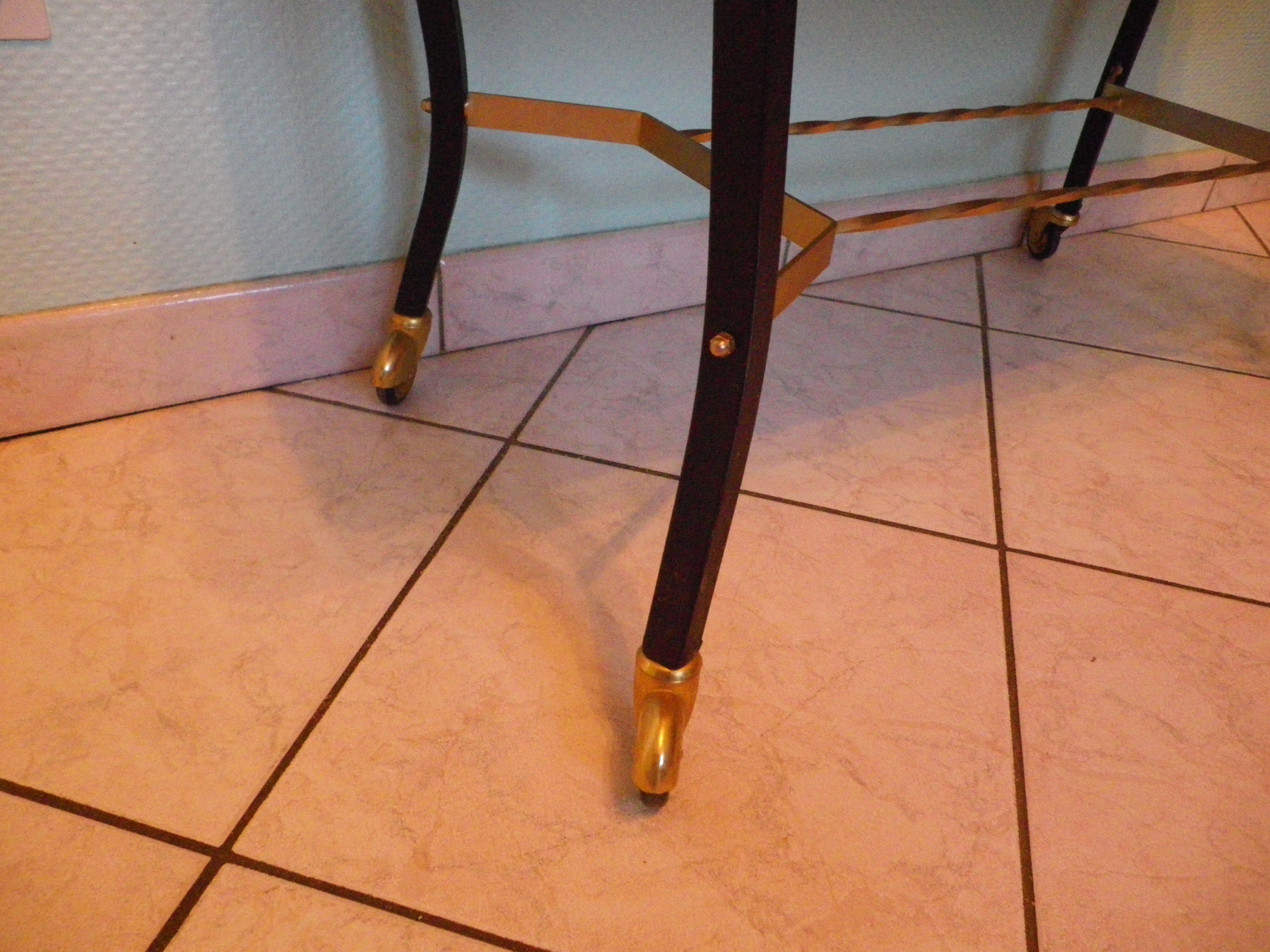 Lounge table, side table on wheels, formica top, gold and black metal