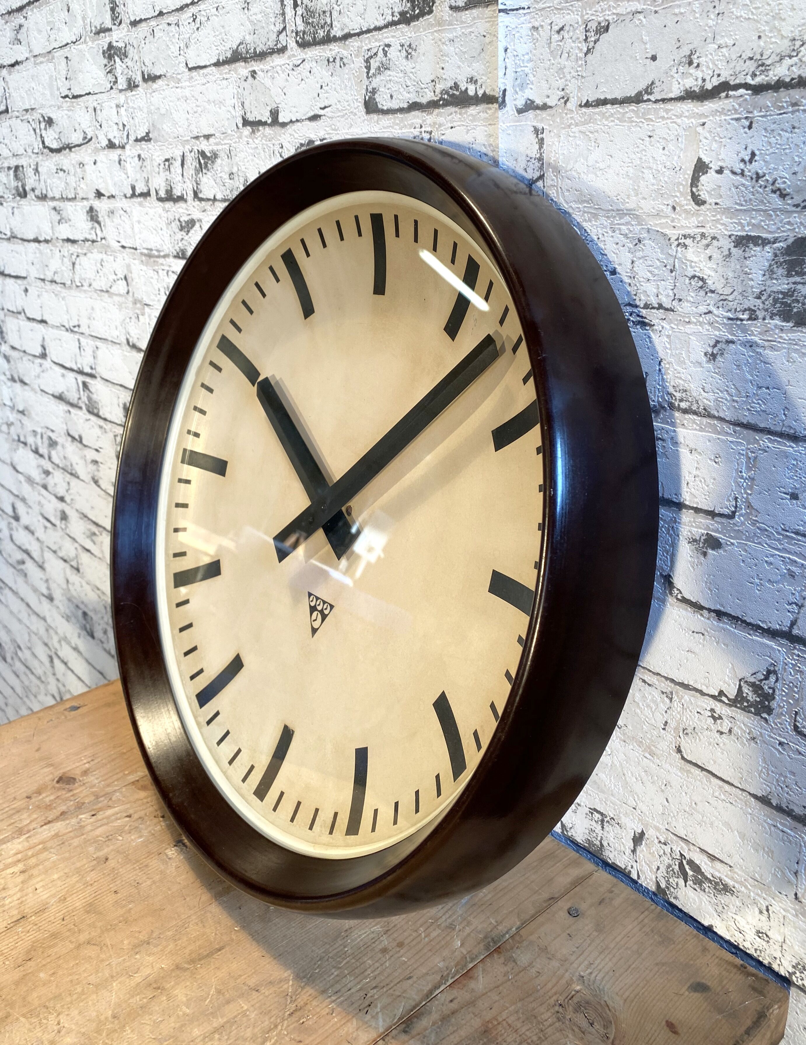 Industrial bakelite factory wall clock from Pragotron, 1960s