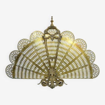 Old fan-shaped chimney fire screen. Gilt bronze. 19th century