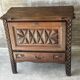 Small storage cabinet in carved oak – circa 1930