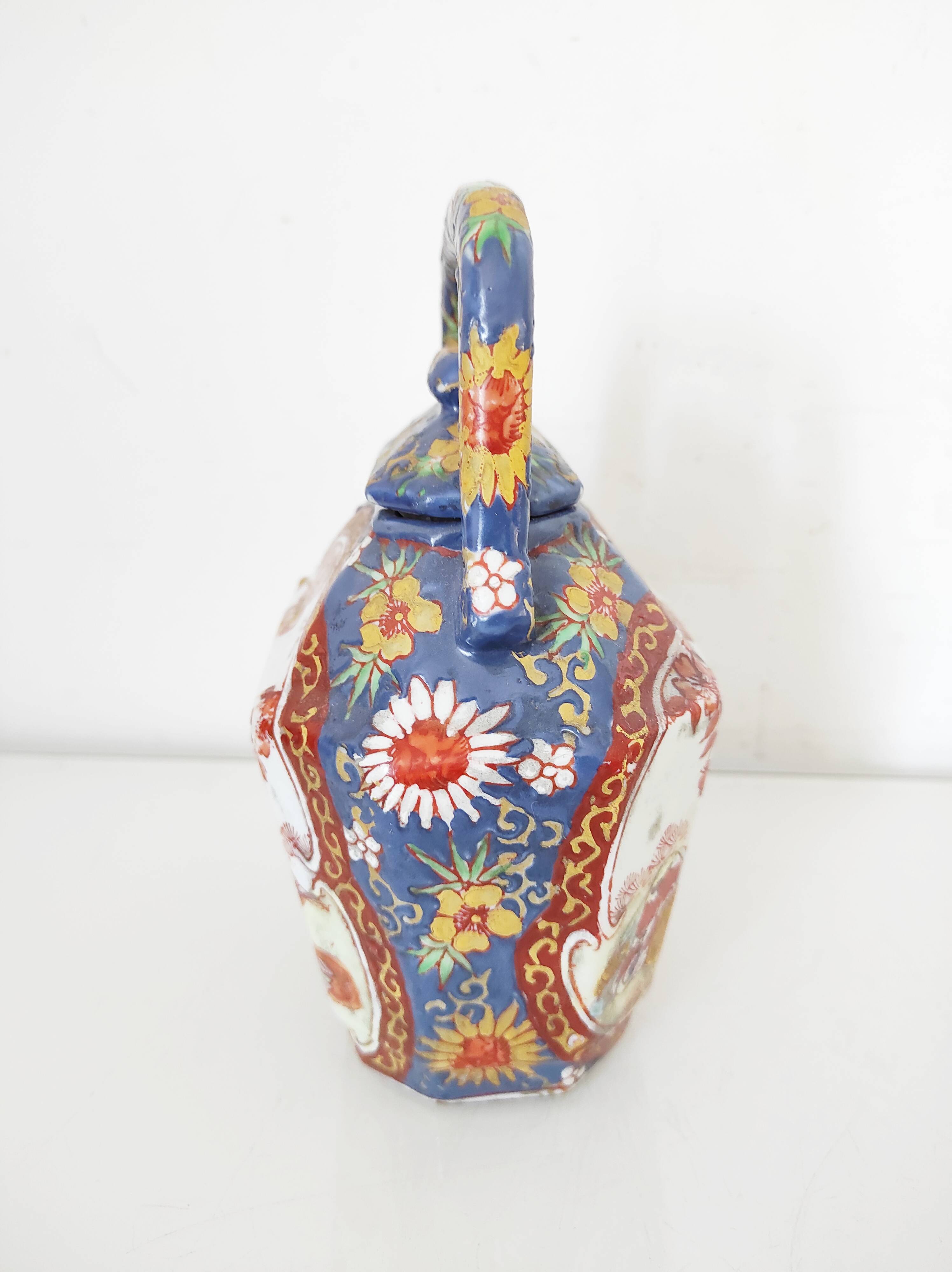 Japanese porcelain teapot with geisha decor