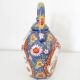 Japanese porcelain teapot with geisha decor