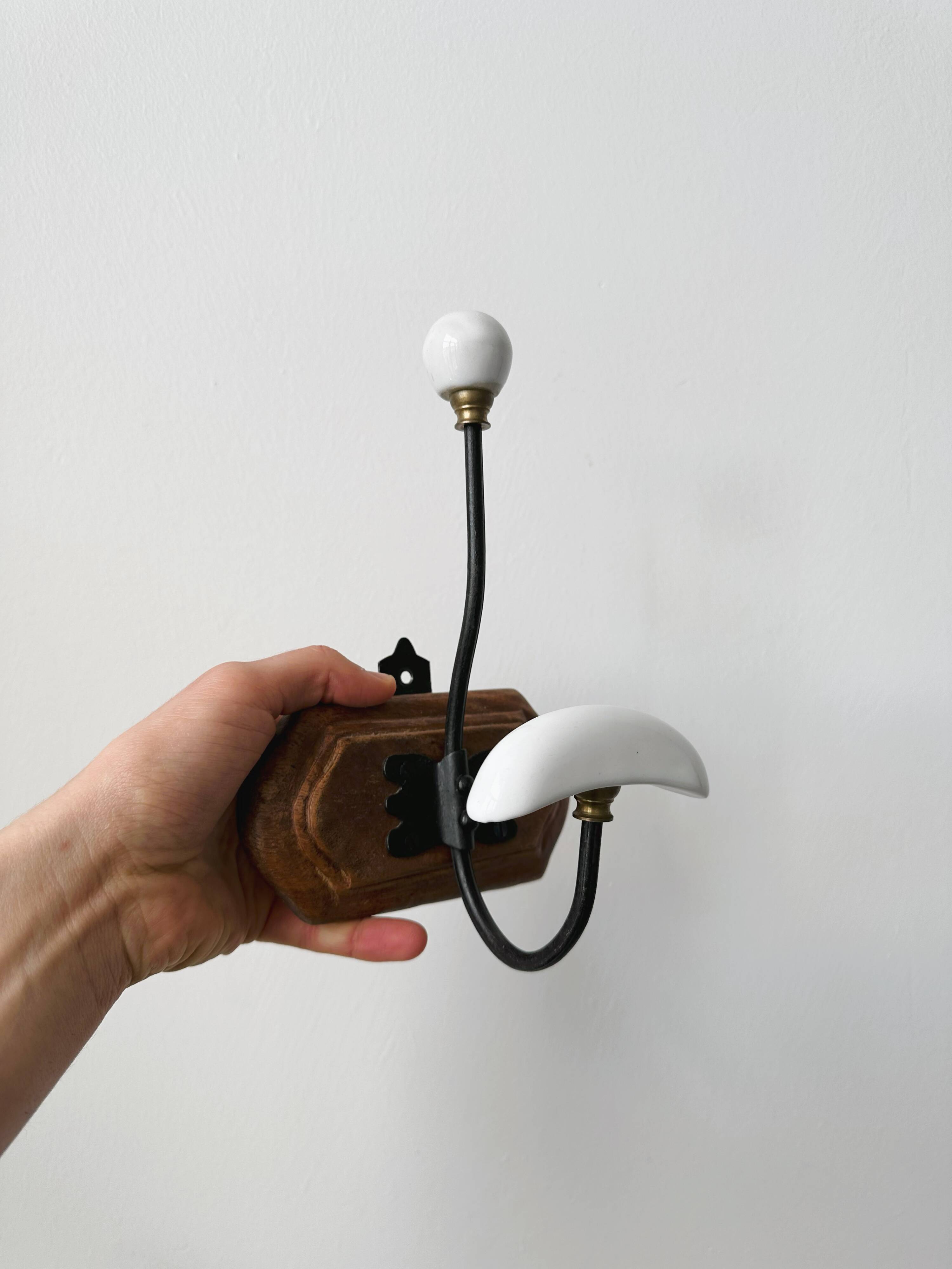 Set of two wooden and porcelain coat hooks