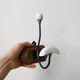 Set of two wooden and porcelain coat hooks