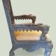 Indian throne chair in carved red wood - Buddhist / Hindu.