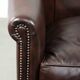Dark cow leather club armchair in good condition with an English design