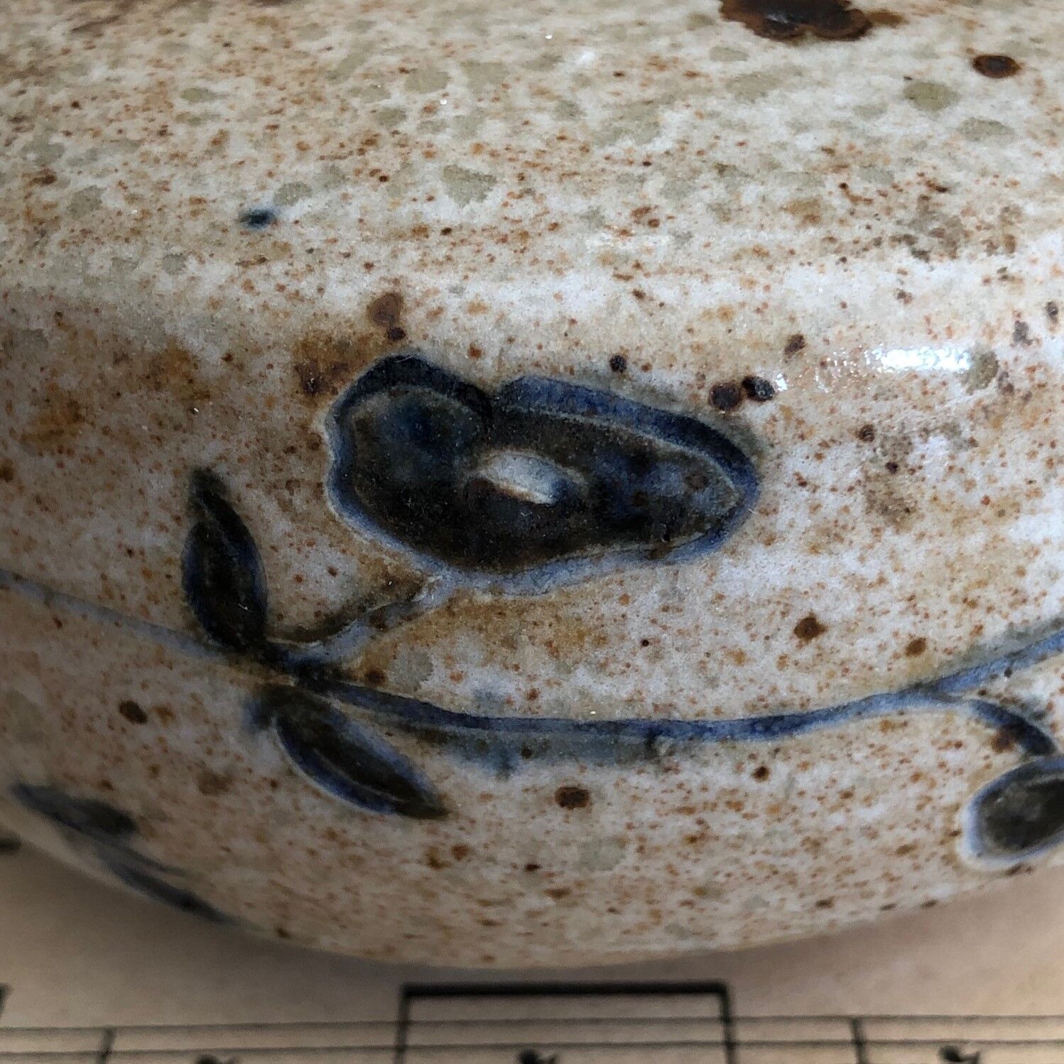 Signed soliflore flower spade in sandstone