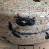 Signed soliflore flower spade in sandstone