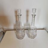 Pair of antique moulded glass decanters