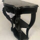 Pair of blackened wooden consoles, marble top